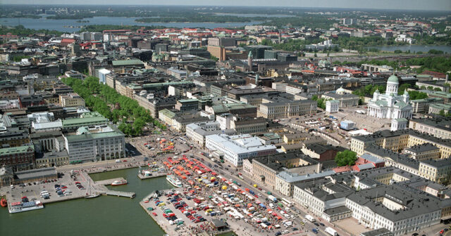 Helsinki's Senate Square, Market Square and harbour photographed from the air on a sunny summer day.