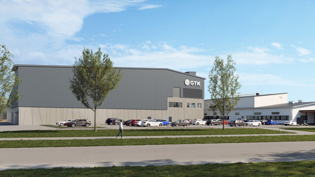 GTK Mintec building with parked cars in front of the building.